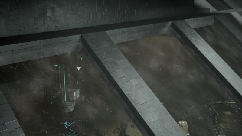 Empty concrete service level seen from above, dust hanging in the light